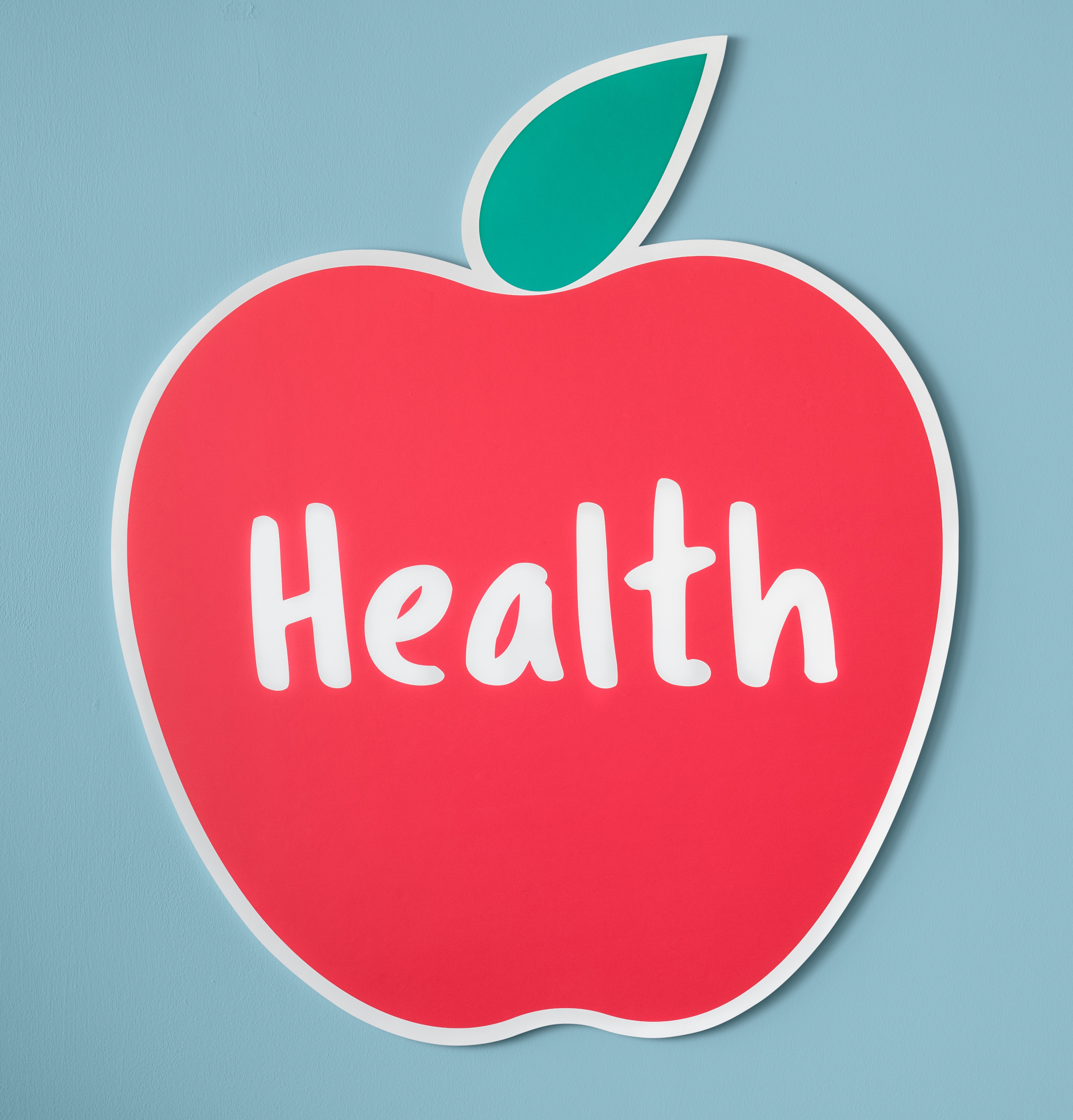 Red apple with word "health" inside